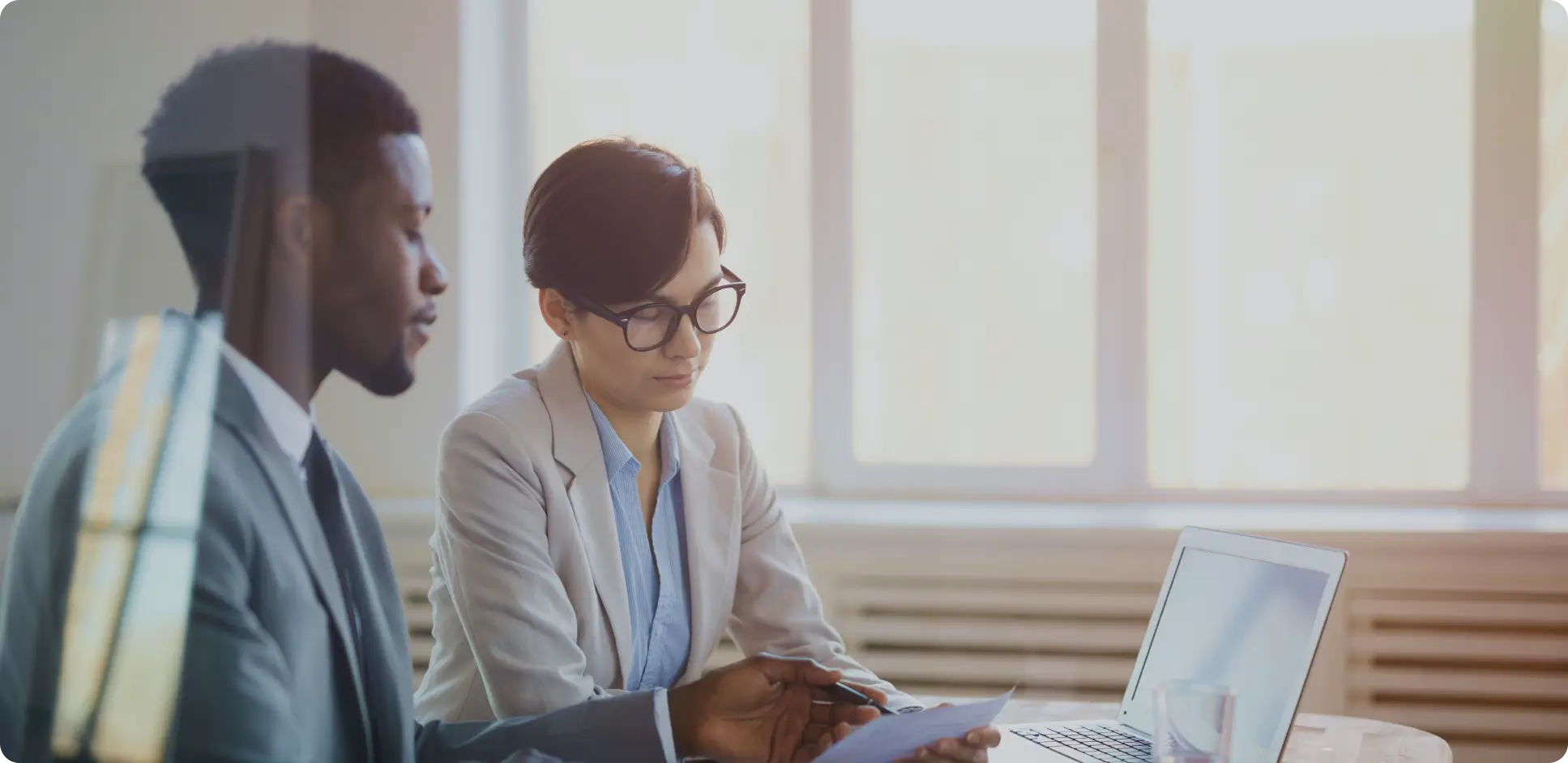 Professionals collaborating in a modern office